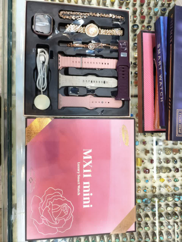 ساعت هوشمند زنانه MX11 Mini مدل Luxury Smart Watch همراه با چند بند و اکسسوری