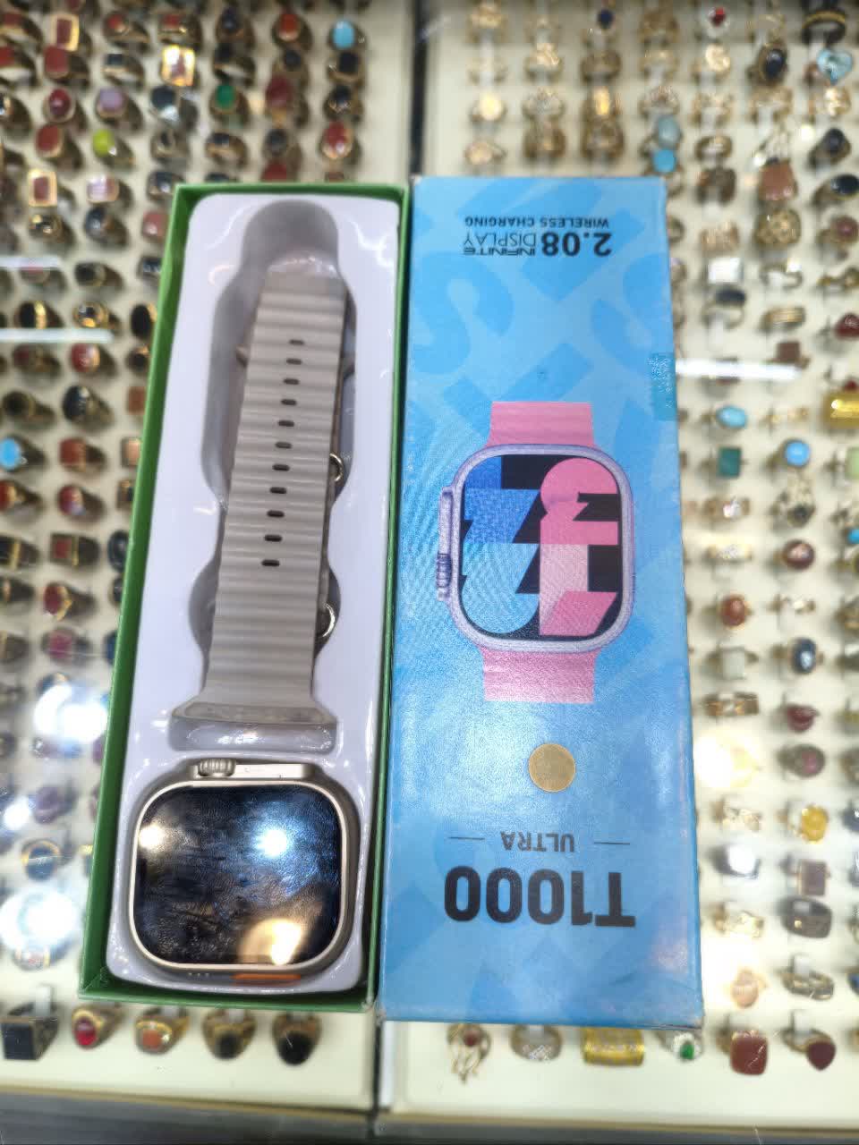 ساعت هوشمند T1000 Ultra طرح اپل واچ با بند سیلیکونی طوسی و صفحه‌نمایش مشکی