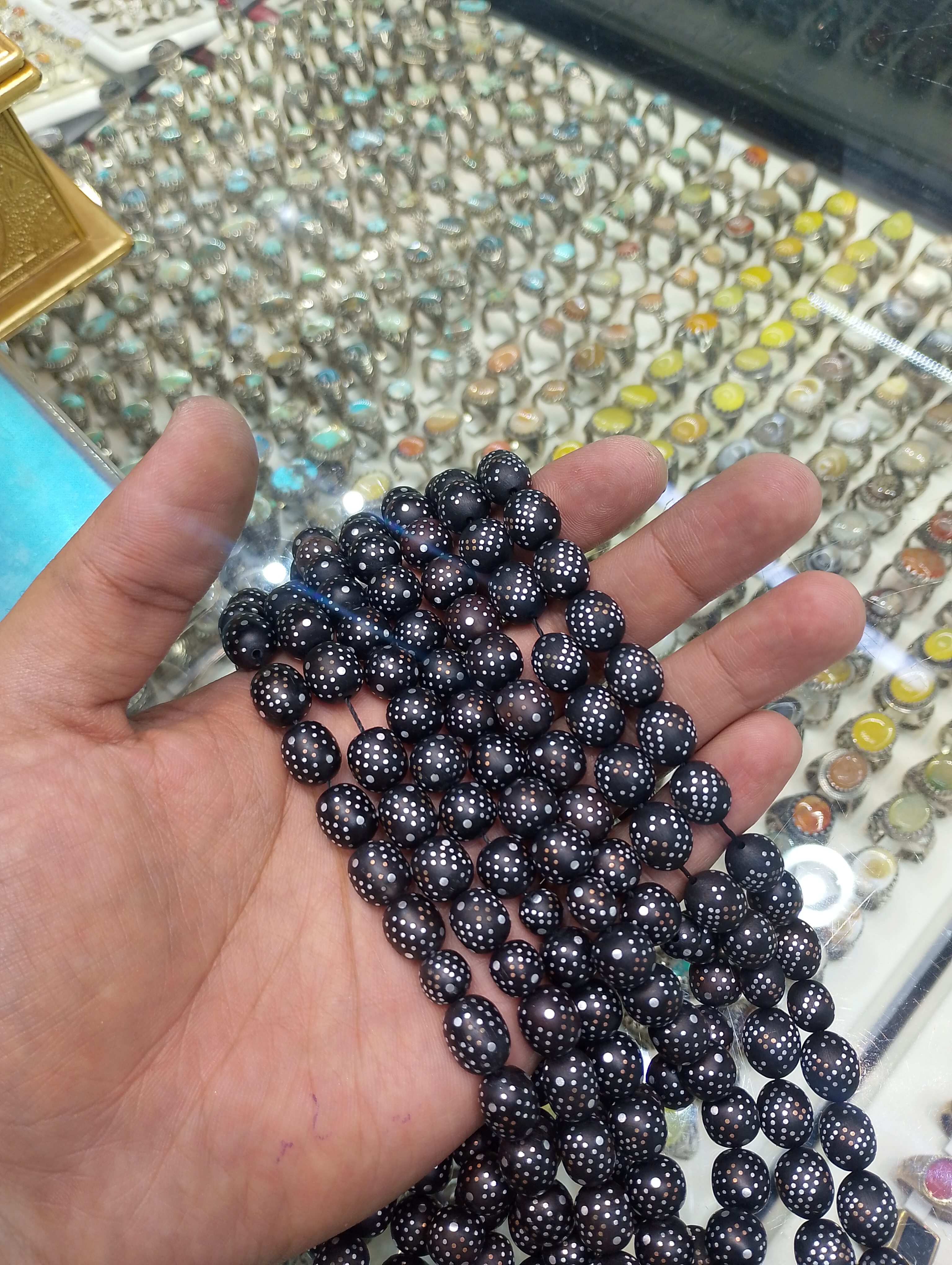 تسبیح هسته خرما طرح نقره کوب
